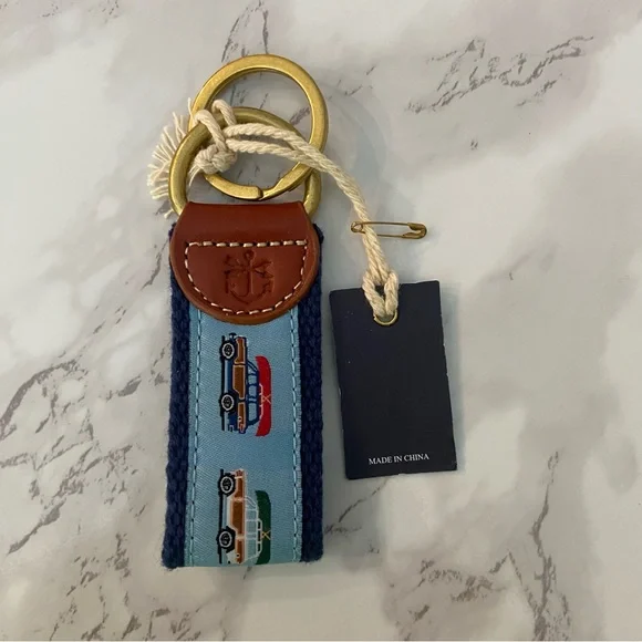 Kiel James Patrick Blue and Brown Keychain with Car Motif - Picture 2 of 2